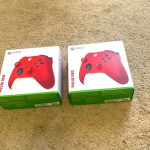 Two brand new pulse red  Xbox controllers.